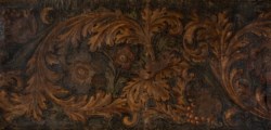 Manifattura italiana del secolo XVIII .- Pannello in cuoio traforato e decorato a motivi floreali e vegetali